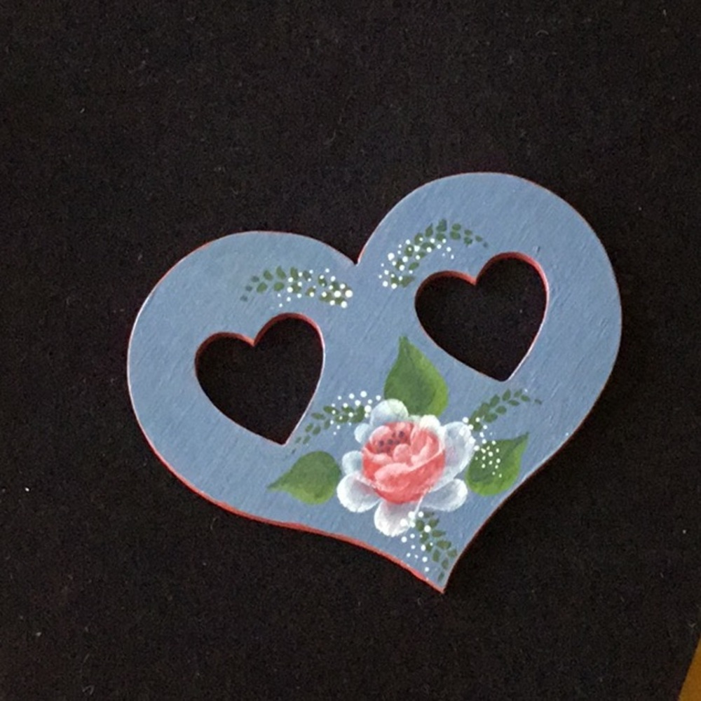Hand painted, wood scarf holder. Wear with scarf.